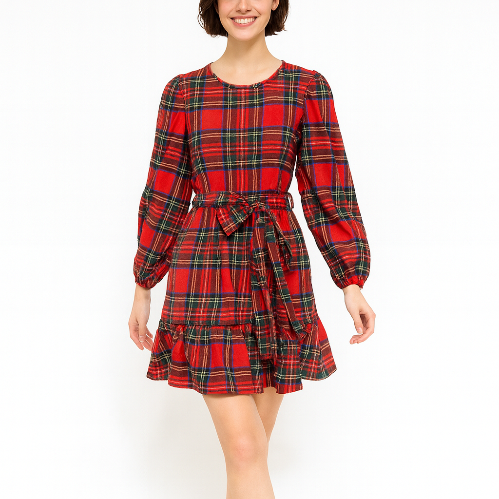 Woman wearing a red plaid dress on a white background